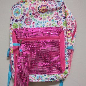 Beautiful backpack  never used without tag with a small purse for keys pens